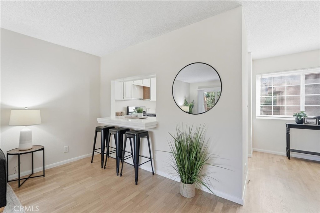 3101 Plaza Del Amo, Unit 8 Torrance, CA 90503 - Photo 6 of 31 a view of a livingroom with furniture and mirror