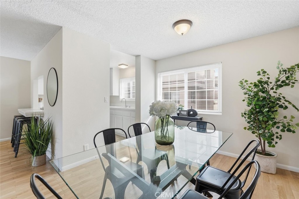 3101 Plaza Del Amo, Unit 8 Torrance, CA 90503 - Photo 7 of 31 a view of a dining room with furniture window and wooden floor