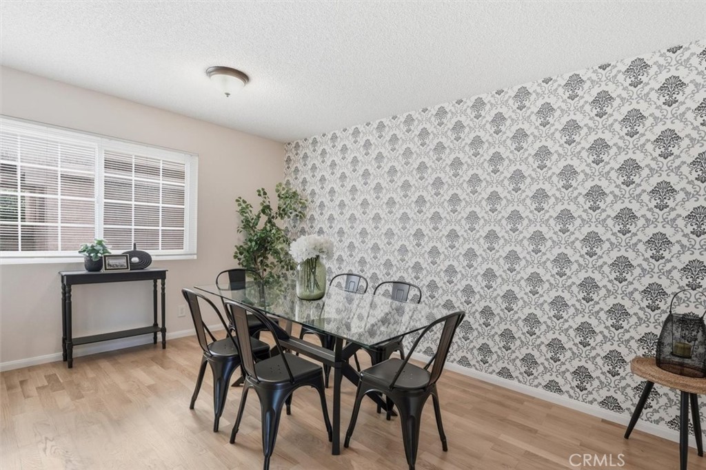3101 Plaza Del Amo, Unit 8 Torrance, CA 90503 - Photo 8 of 31 a view of a dining room with furniture and wooden floor