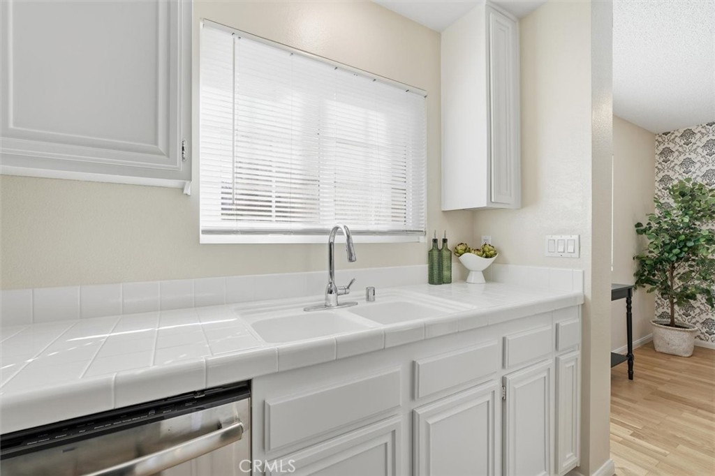 3101 Plaza Del Amo, Unit 8 Torrance, CA 90503 - Photo 10 of 31 a bathroom with a sink and a window