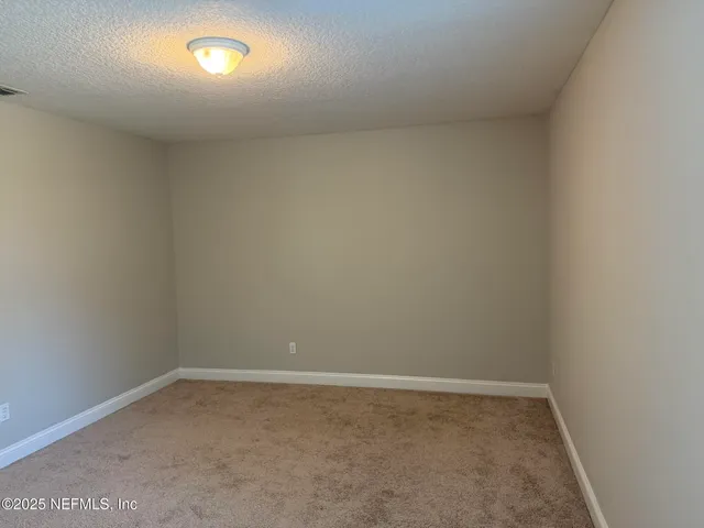 an empty room with an entryway