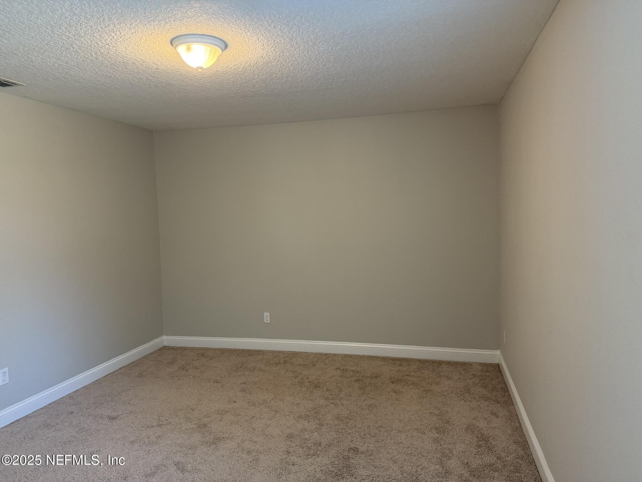12198 Ridge Crossing Way Jacksonville, FL 32226 - Photo 16 of 28 a view of an empty room