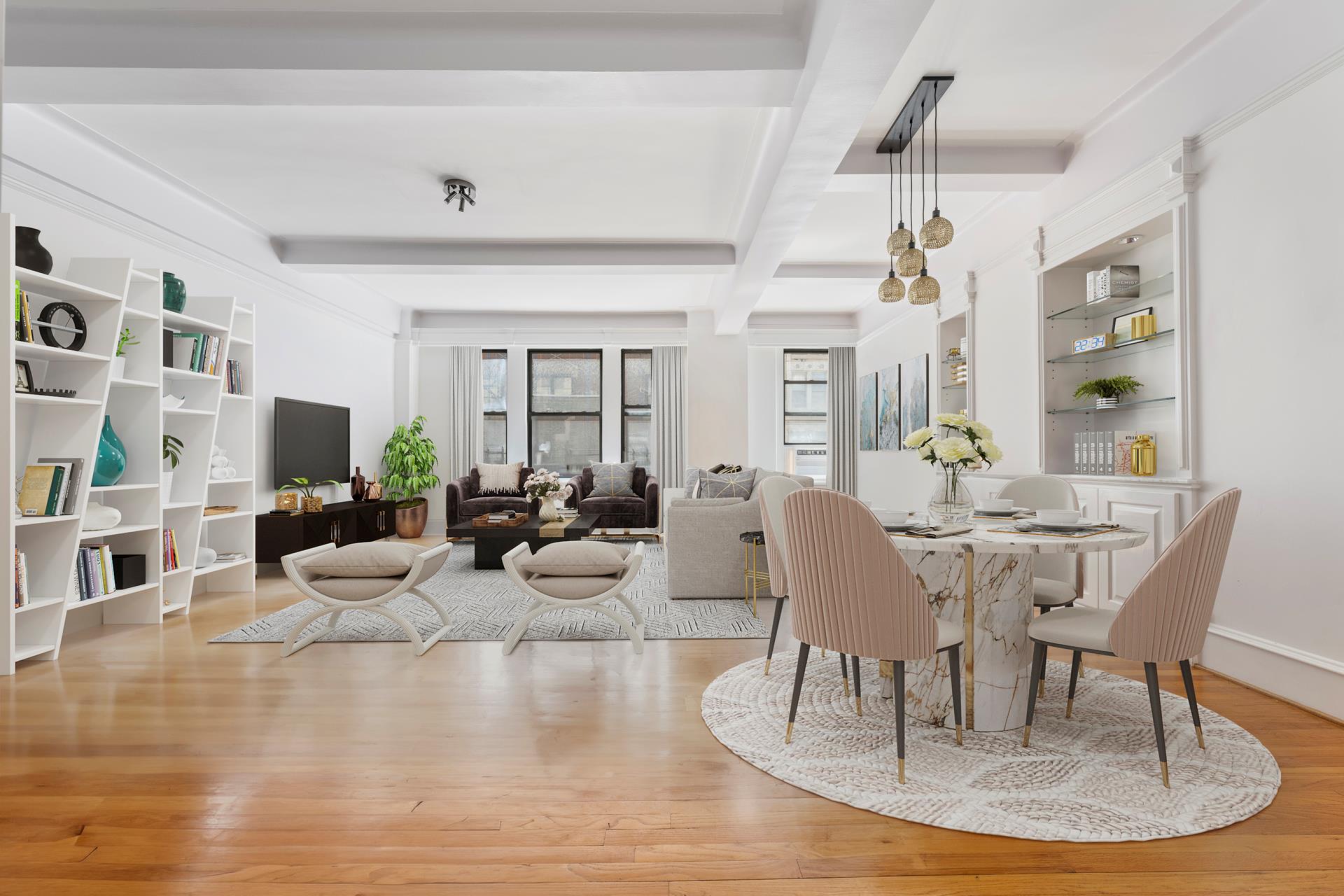 a view of a dining room with furniture a rug and wooden floor
