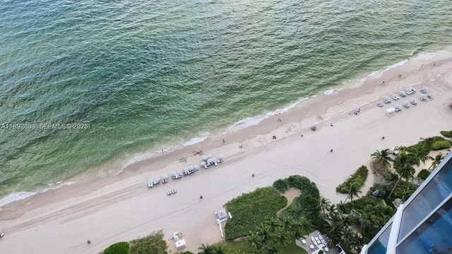 a view of a beach with an ocean view