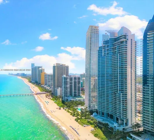 a view of a city with tall buildings