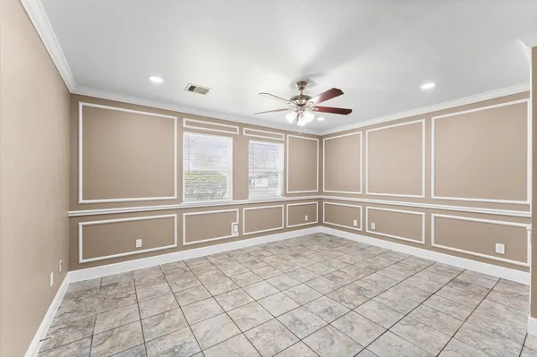 a view of an empty room and window