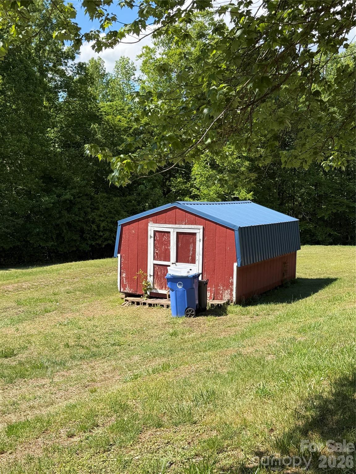 781 Rock Road Rutherfordton, NC 28139 - Photo 14 of 28 a house with a yard in front of it