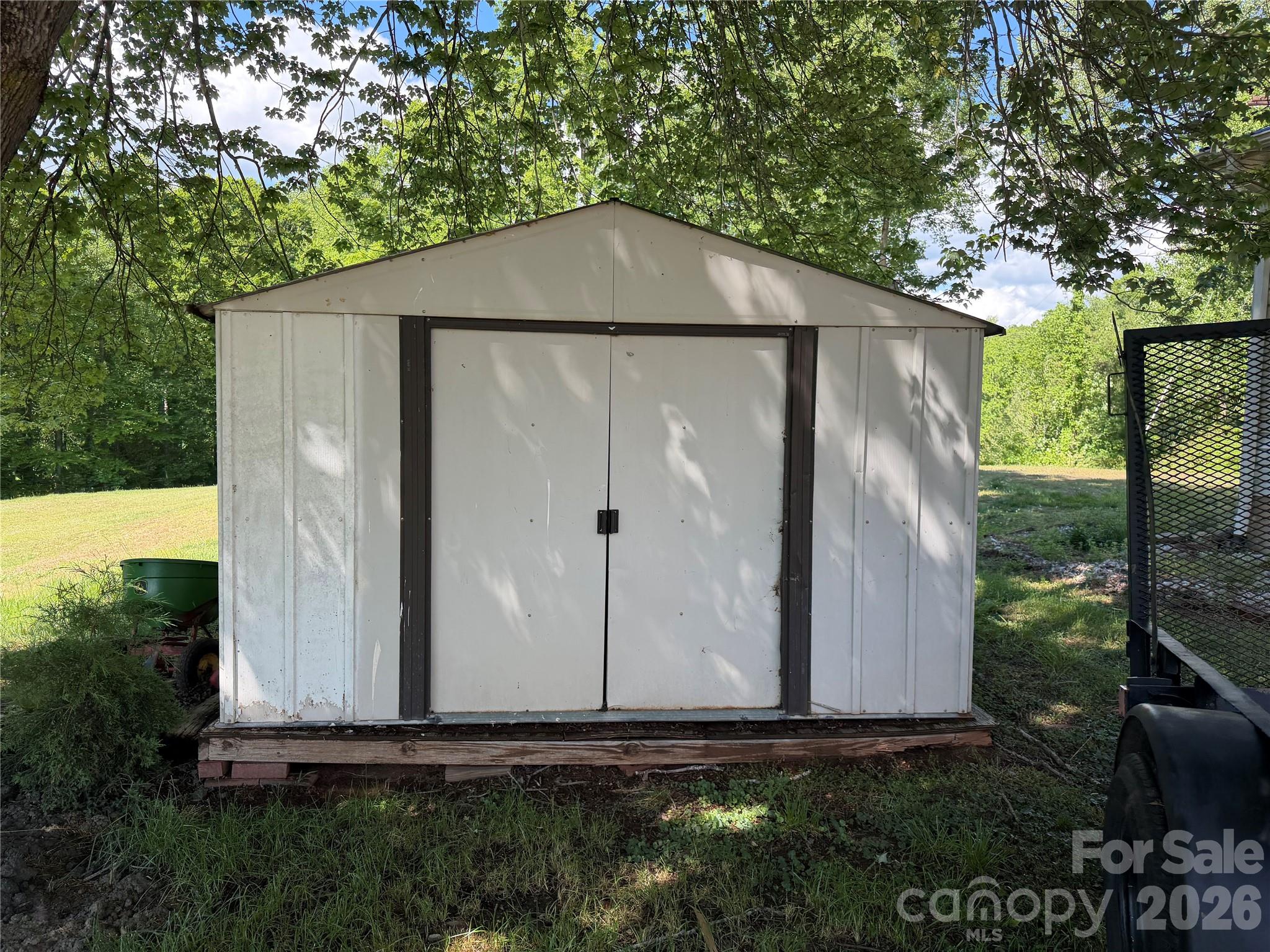 781 Rock Road Rutherfordton, NC 28139 - Photo 15 of 28 a backyard of a house with lots of green space