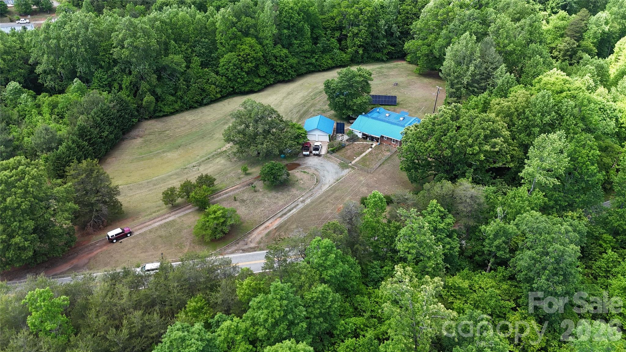 781 Rock Road Rutherfordton, NC 28139 - Photo 20 of 28 an aerial view of a house with a yard