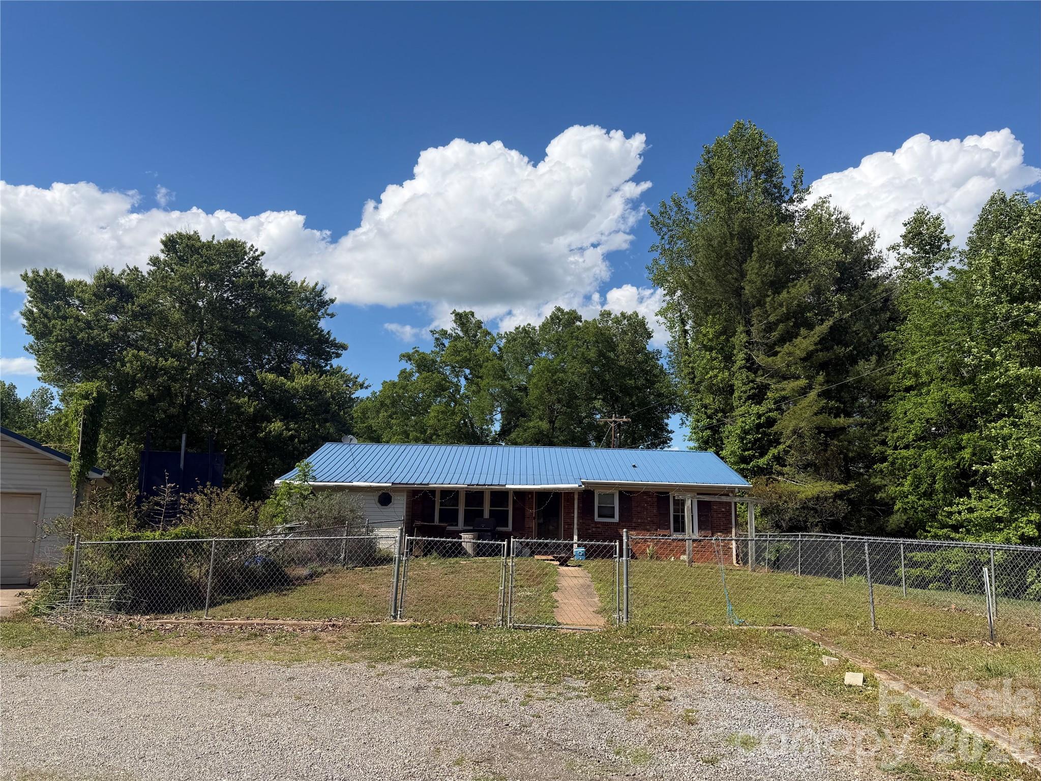 781 Rock Road Rutherfordton, NC 28139 - Photo 4 of 28 a view of a house with a yard