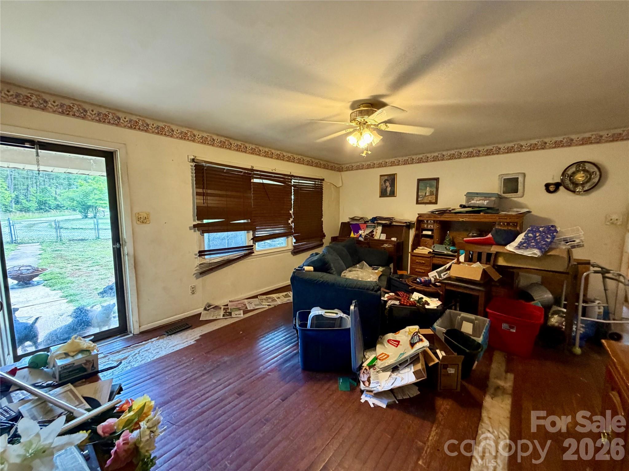 781 Rock Road Rutherfordton, NC 28139 - Photo 9 of 28 a living room with lots of furniture and wooden floor