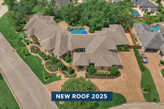 Situated on an over 1/2 acre corner, cul-de-sac lot with massive appeal from side yard to green space in back! This is an estate home to behold!