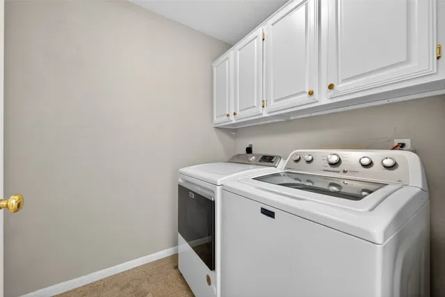 a stove top oven sitting inside of a kitchen