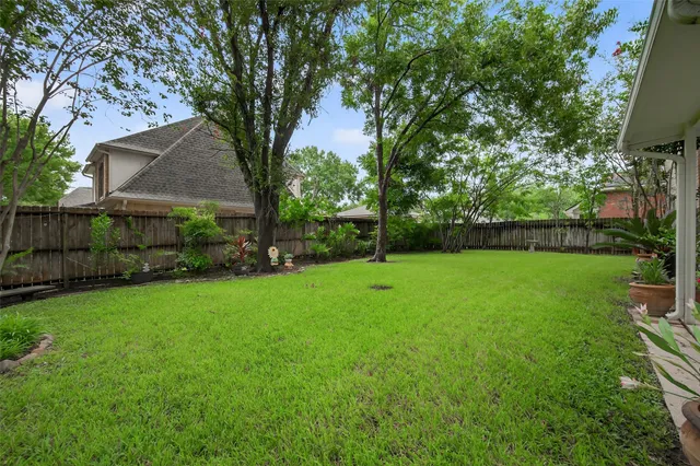 a view of a backyard with a garden