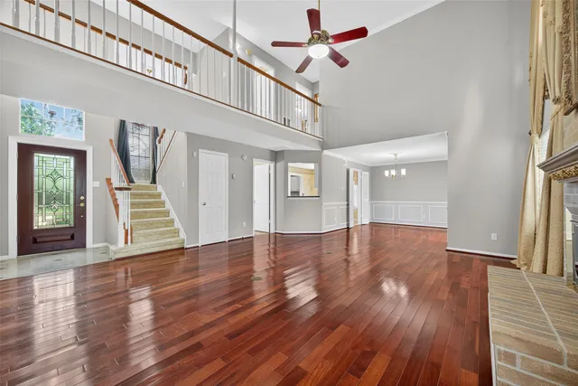 a view of an entryway with wooden floor and a window
