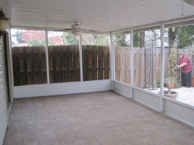 5415 Rutland Court Orlando, FL 32812 - Photo 17 of 25 a view of a room with a large window