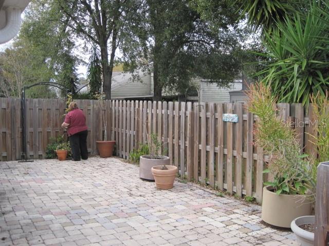 5415 Rutland Court Orlando, FL 32812 - Photo 18 of 25 a view of a wrought iron fences in front of house