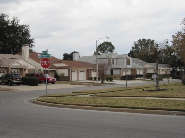 5415 Rutland Court Orlando, FL 32812 - Photo 22 of 25 a front view of a house with a garden