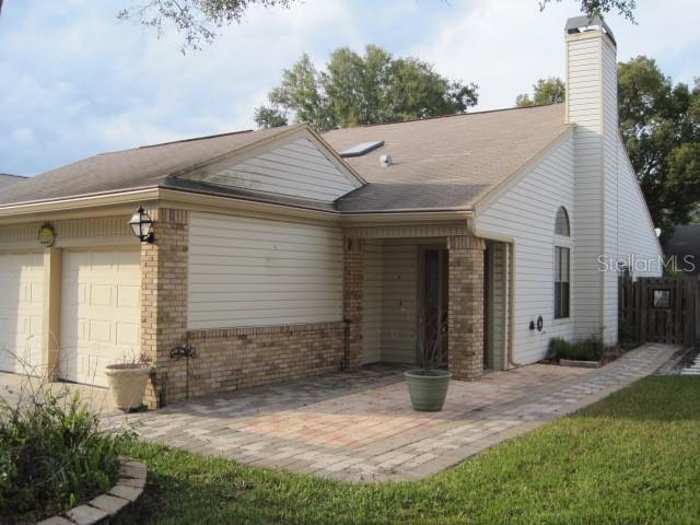 5415 Rutland Court Orlando, FL 32812 - Photo 4 of 25 a view of a house with backyard