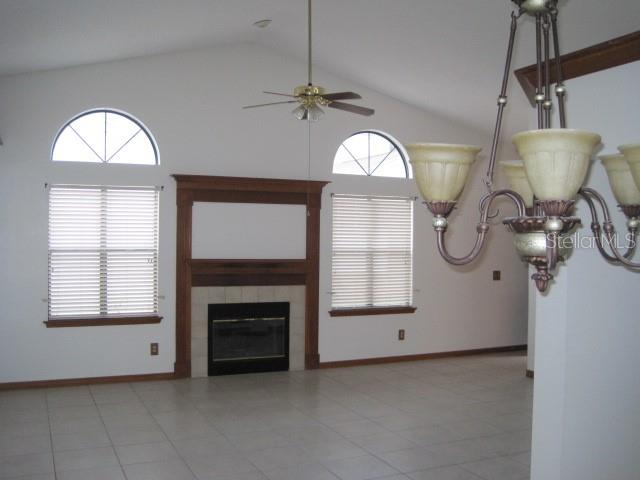 5415 Rutland Court Orlando, FL 32812 - Photo 6 of 25 a view of a livingroom with furniture mirror and window