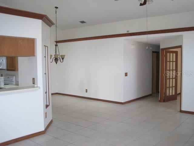 5415 Rutland Court Orlando, FL 32812 - Photo 8 of 25 a view of a room with a hallway