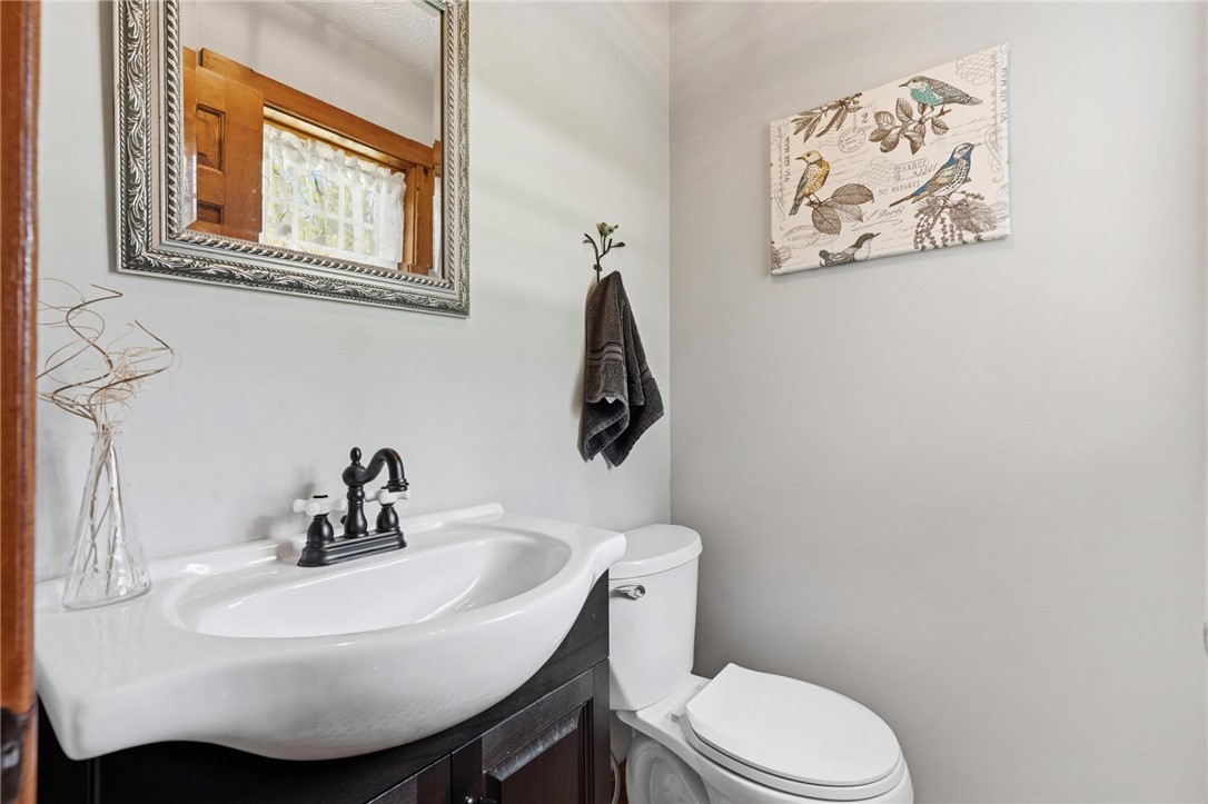 4971 Lackey Road Cedarville, OH 45314 - Photo 20 of 79 This clean and bright bathroom features a classic vanity and essential fixtures for everyday convenience.