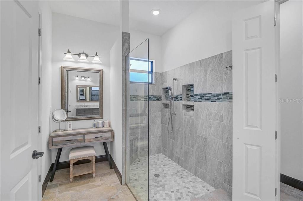 113 Burney Road Osprey, FL 34229 - Photo 23 of 42 a bathroom with a shower