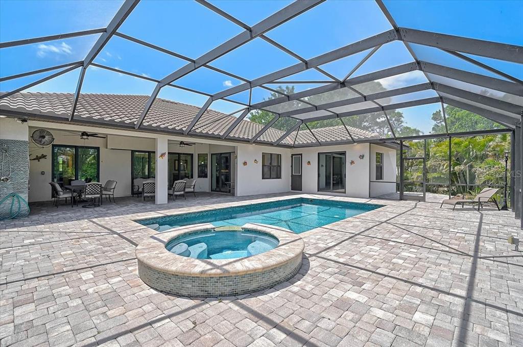 113 Burney Road Osprey, FL 34229 - Photo 5 of 42 a view of a house with roof deck