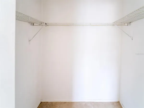 a view of small space with racks on the wall