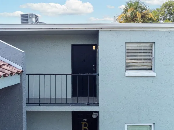 a bathroom with a sink a mirror and vanity