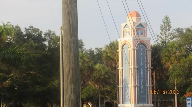 a view of a house with a small yard