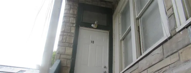 a close view of stair and mirror