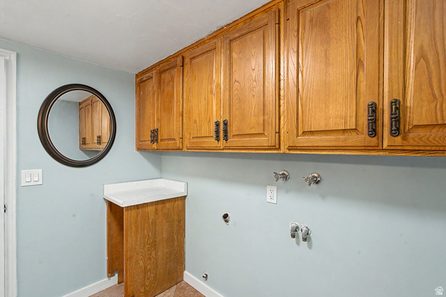 1933 Rua Branco Drive, Unit 107 Sandy, UT 84093 - Photo 16 of 20 Wood-finish cabinetry with decorative hardware