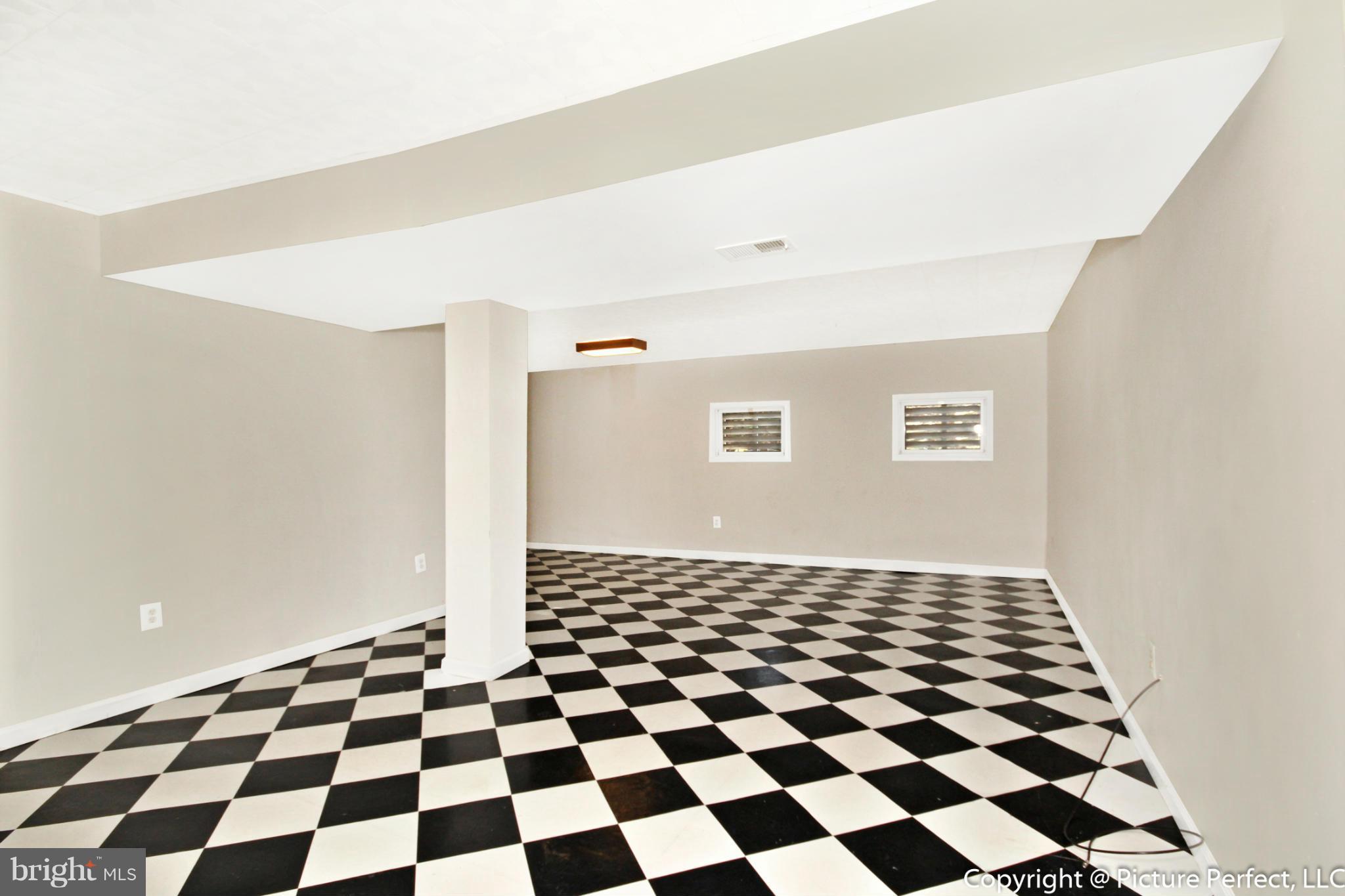 19111 Munger Farm Road Poolesville, MD 20837 - Photo 26 of 30 a black and white checkered floor
