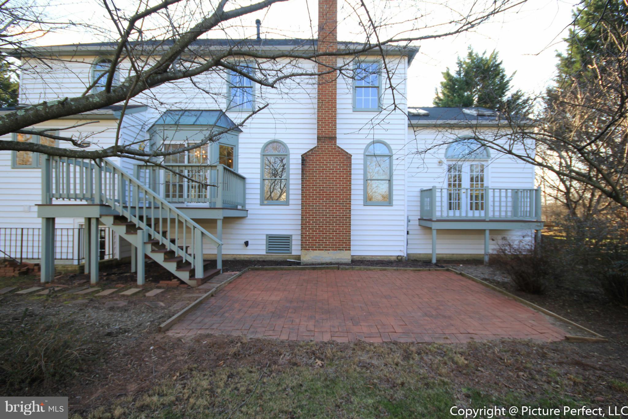19111 Munger Farm Road Poolesville, MD 20837 - Photo 5 of 30 a front view of a house with a yard
