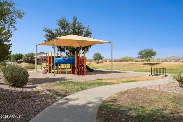 a view of a backyard with a patio