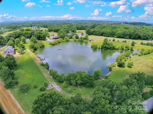a view of a lake with a houses