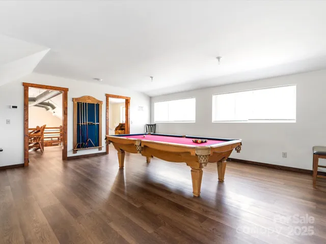 a view of a balcony with wooden floor