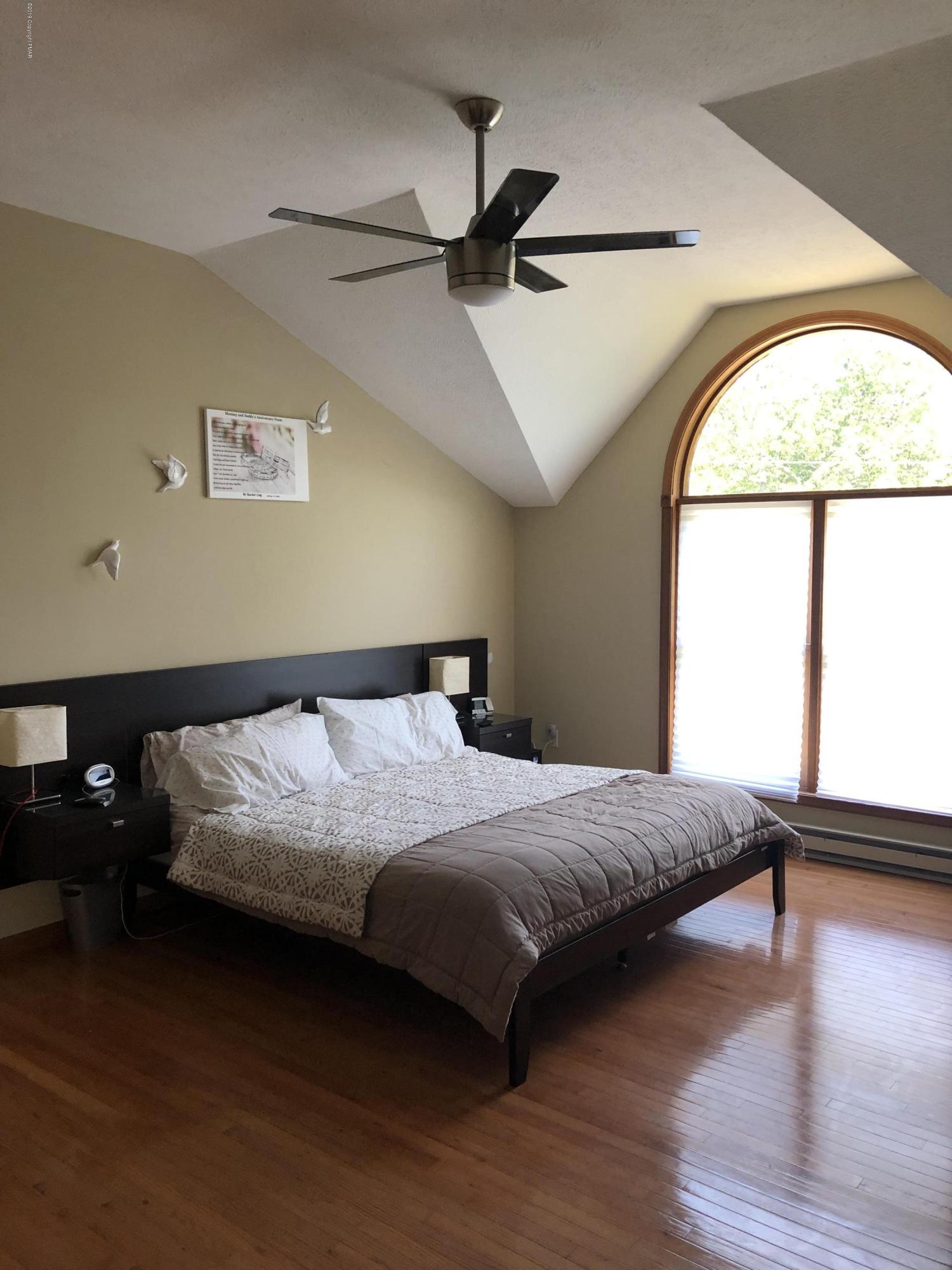 189 Gold Finch Road Bushkill, PA 18324 - Photo 18 of 23 a bedroom with a bed and a window