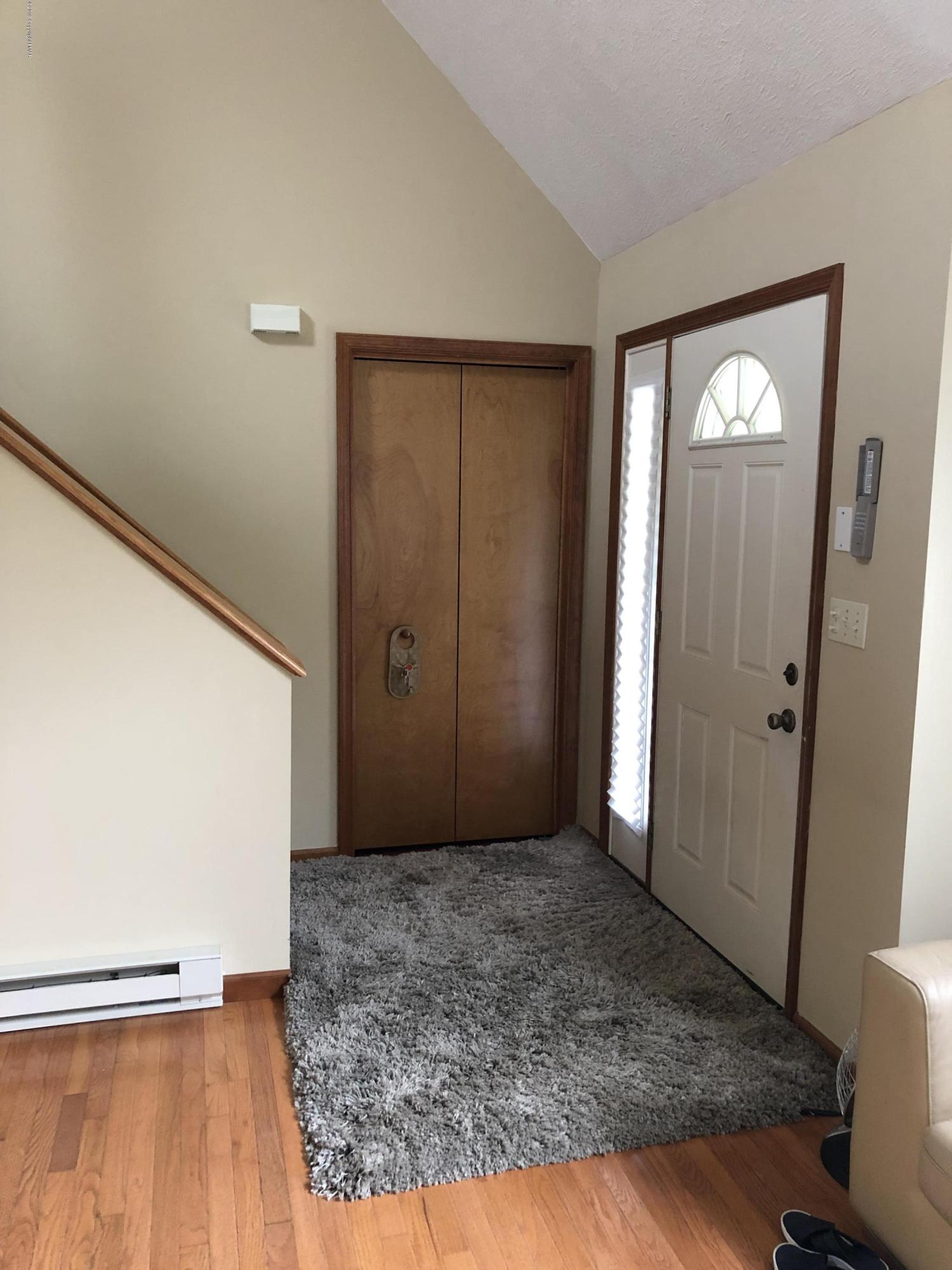 189 Gold Finch Road Bushkill, PA 18324 - Photo 8 of 23 a view of a room with wooden floor and bathroom
