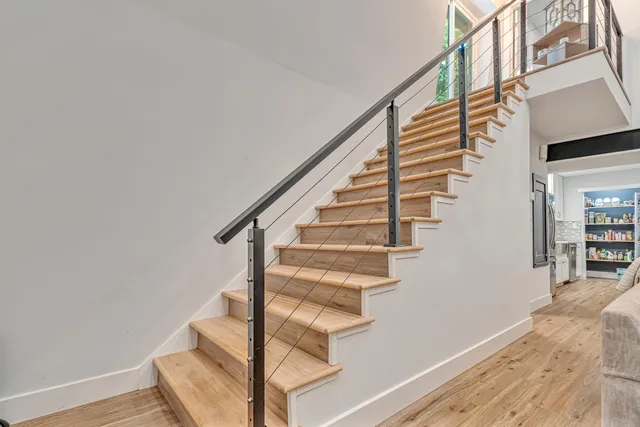 a view of balcony with wooden floor