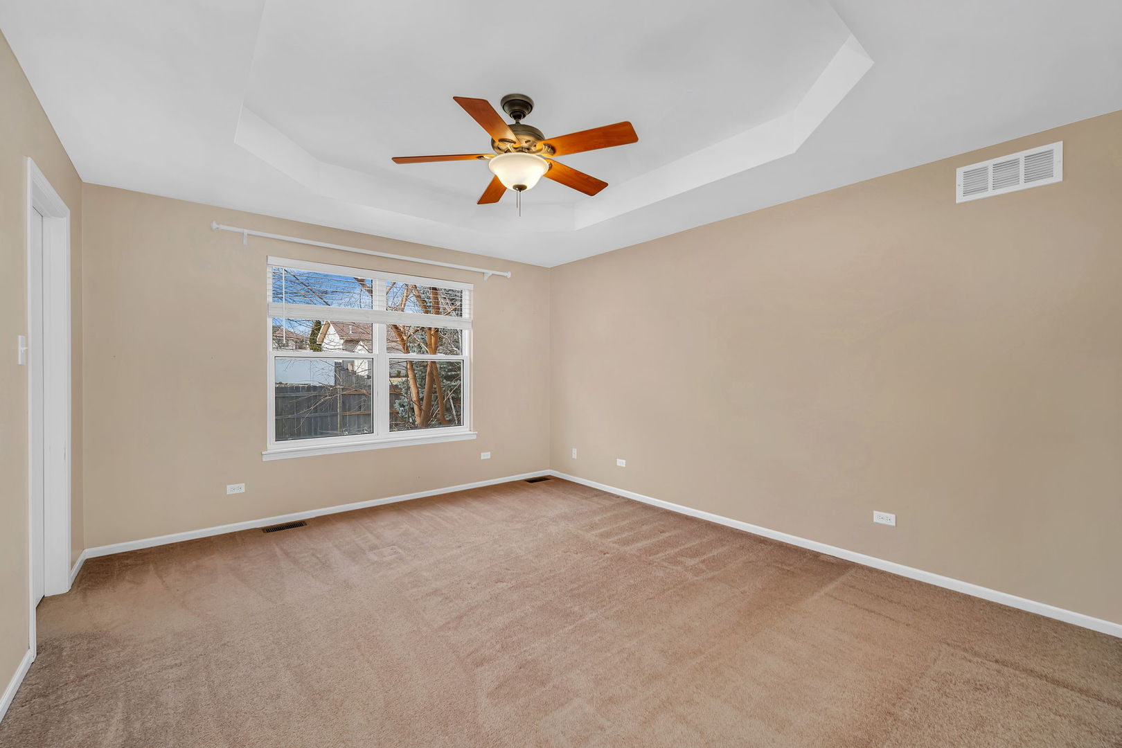 1211 Bluejay Lane Plainfield, IL 60586 - Photo 18 of 32 a view of an empty room with a window