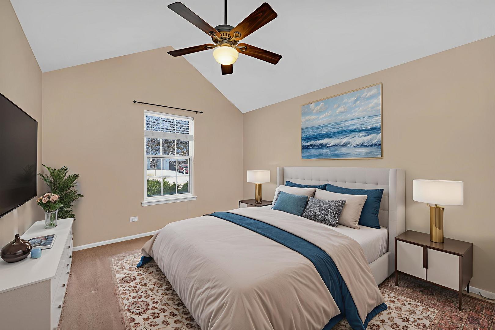 1211 Bluejay Lane Plainfield, IL 60586 - Photo 21 of 32 a bedroom with a large bed and a chandelier