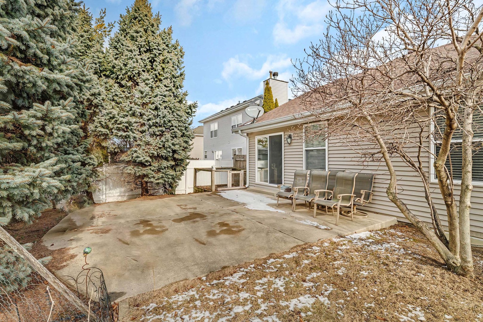 1211 Bluejay Lane Plainfield, IL 60586 - Photo 30 of 32 a view of a house with a patio