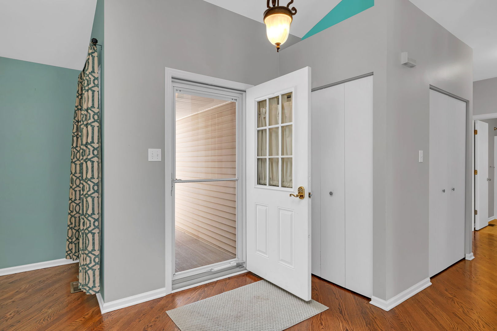 1211 Bluejay Lane Plainfield, IL 60586 - Photo 3 of 32 a view of a livingroom with wooden floor and window