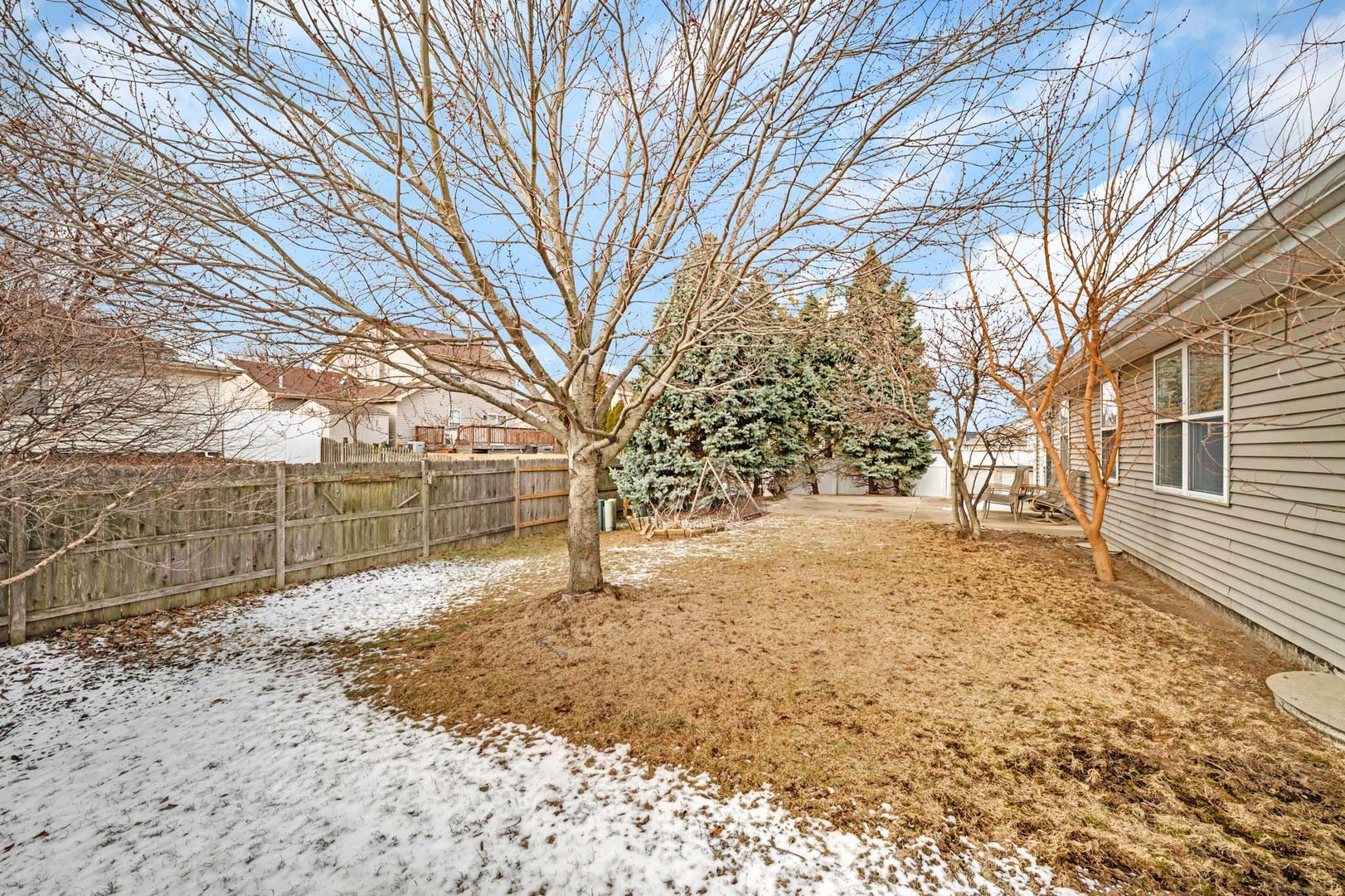 1211 Bluejay Lane Plainfield, IL 60586 - Photo 31 of 32 a backyard of a house