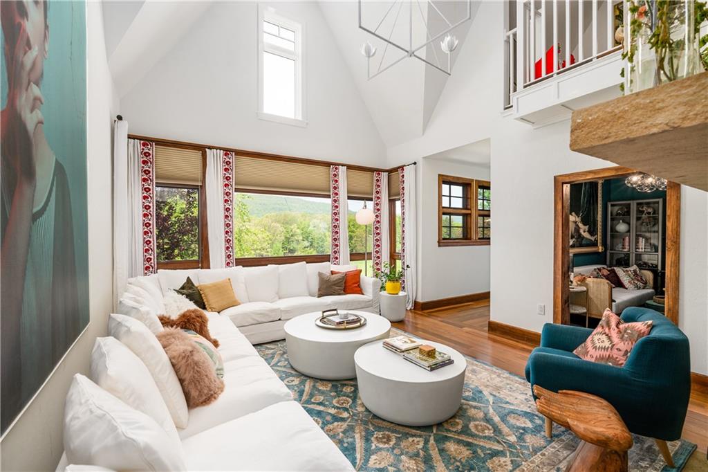 311 Derry Ridge Road Ligonier, PA 15658 - Photo 7 of 39 a living room with furniture and a large window