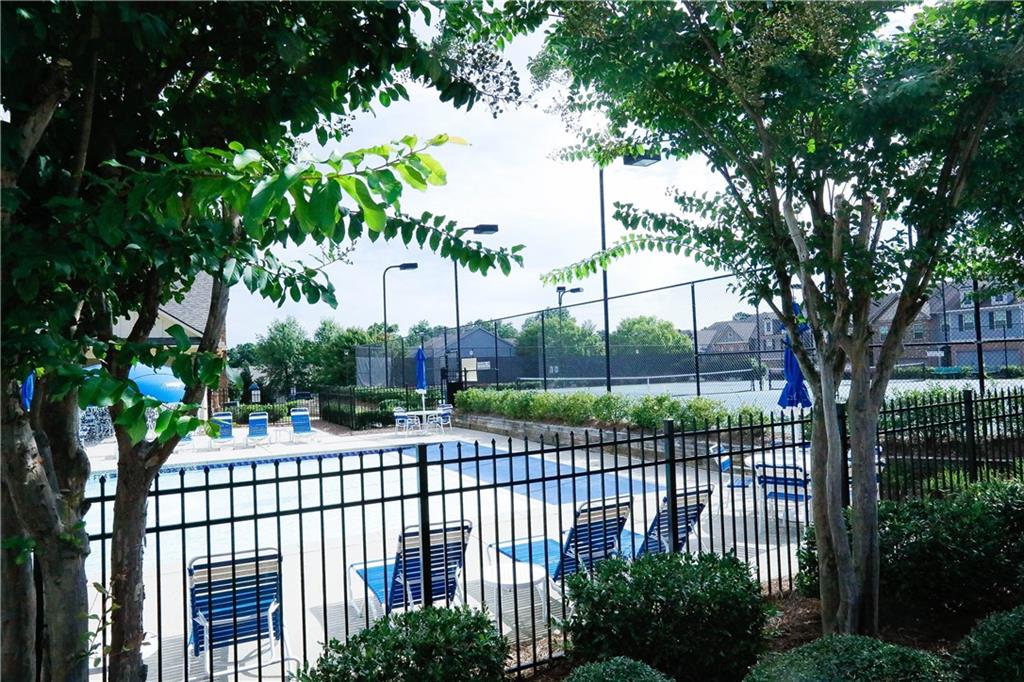 2410 Sardis Chase Court Buford, GA 30519 - Photo 34 of 35 a view of a balcony and a tree