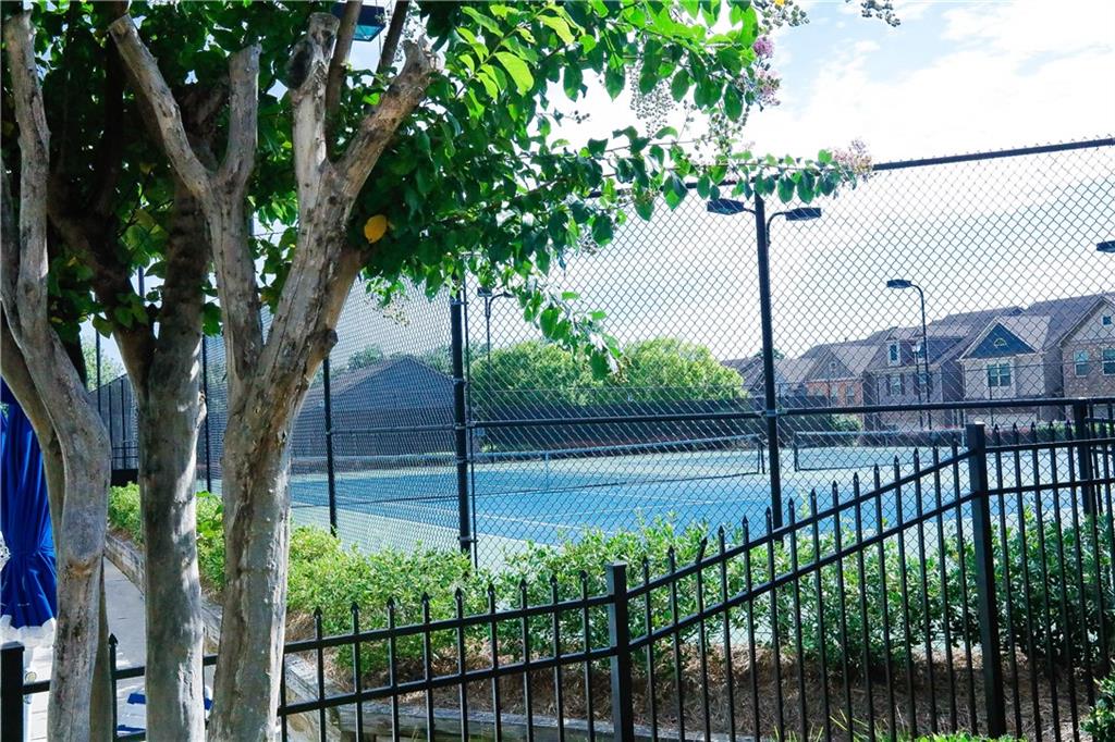 2410 Sardis Chase Court Buford, GA 30519 - Photo 35 of 35 a view of a yard and a tree