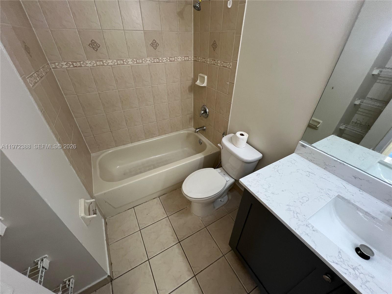 100 Southwest 15th Avenue Homestead, FL 33030 - Photo 20 of 62 a bathroom with a sink a toilet and a bathtub